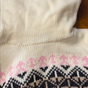 Nice cream color very comfortable turtleneck